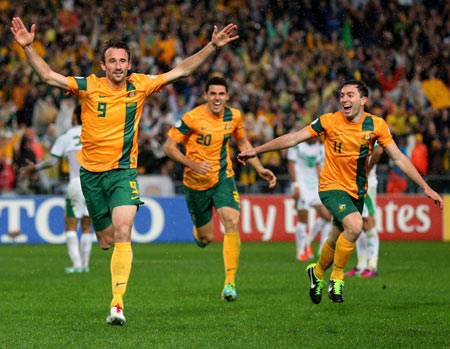 Joshua Kennedy celebrates after scoring the winning goal in the FIFA 2014 World Cup Asian Qualifier match against Iraq