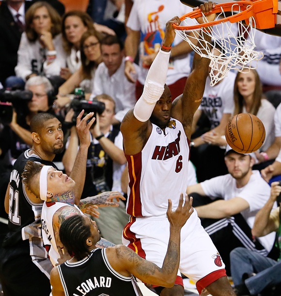LeBron James (6) of the Miami Heat dunks the ball