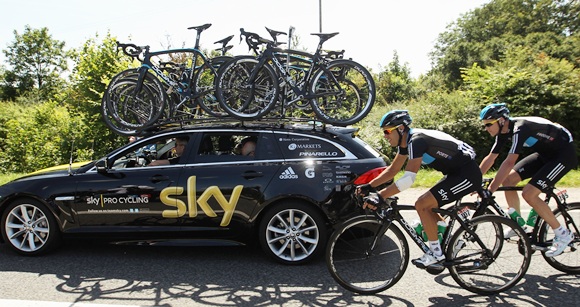 Richie Porte of Australia and SKY Procycling rides alongside the team car