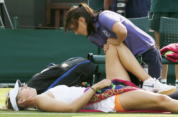Maria Sharapova of Russia receives medical attention
