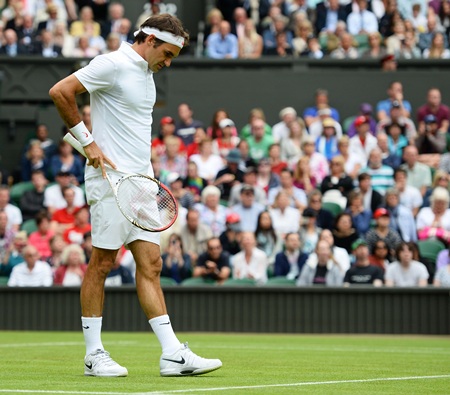  A dejected Federer wonders what went wrong against Stakhovsky
