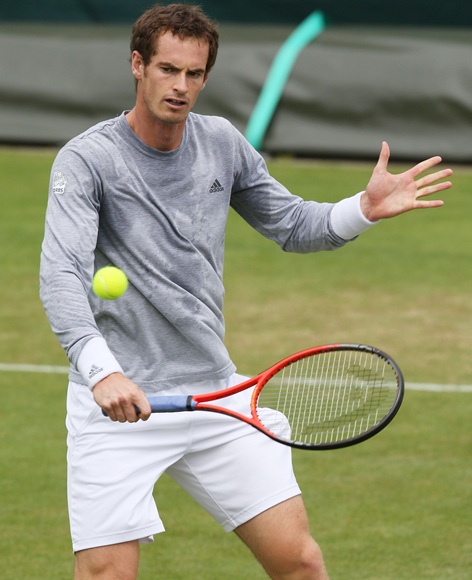 Andy Murray of Great Britain plays a backhand during a practice session