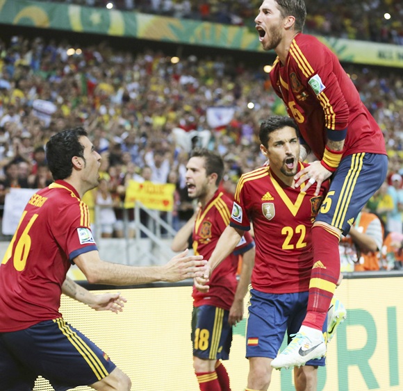 Spain's Jesus Navas (22) celebrates with his teammate