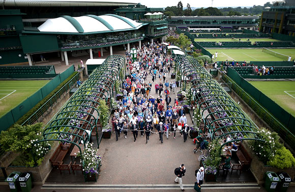 Spectators are admitted to the Wimbledon Lawn Tennis Championships