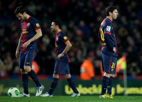 Dejected Barcelona players after losing a game
