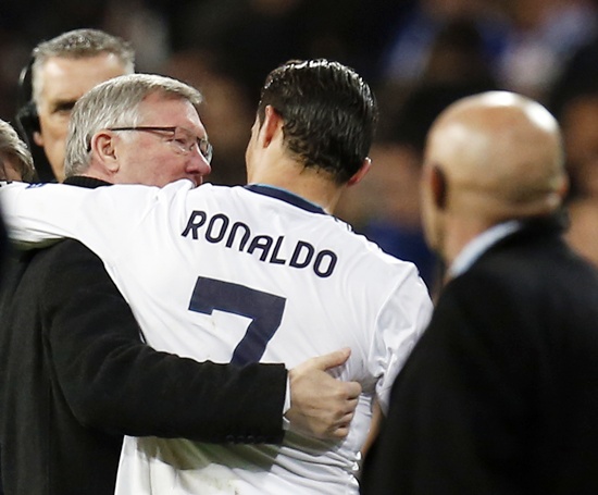 Manchester United's manager Sir Alex Ferguson (left) speaks to Real Madrid's Cristiano Ronaldo