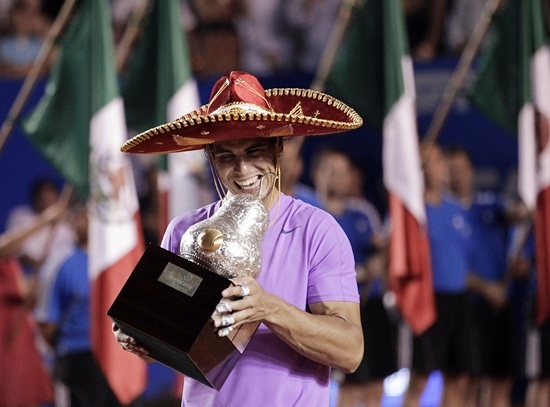Rafael Nadal of Spain wearing a sombrero, a traditional Mexican hat