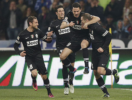 Juventus' Giorgio Chiellini (right) with teammates