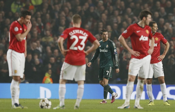 Real Madrid's Cristiano Ronaldo (centre) reacts after scoring against Manchester United