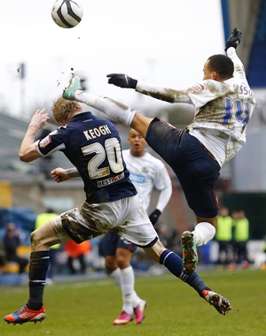 Andy Keogh (left) of Millwall and Markus Olsson of Blackburn Rovers