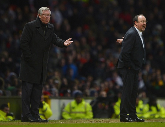 Manchester United's manager Alex Ferguson (left) gestures as Chelsea's interim manager Rafael Benitez shouts