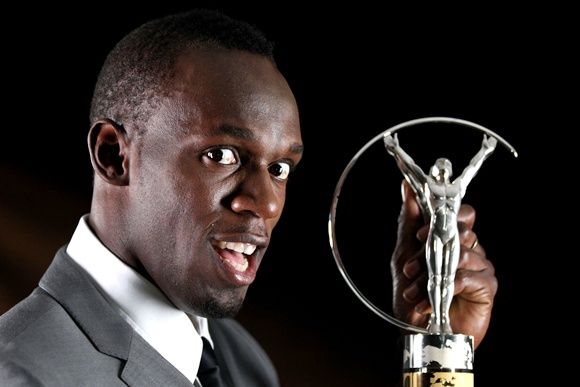 Usain Bolt with the Laureus World Sportsman of the Year award in 2013
