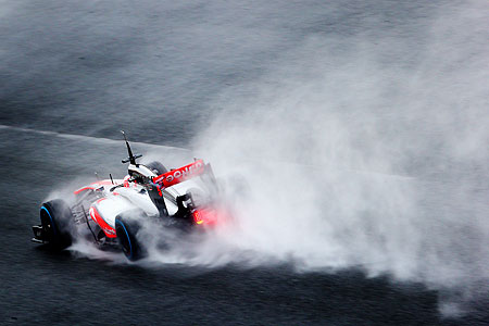 Jenson Button of Great Britain and McLaren drives
