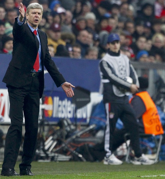 Arsenal's coach Arsene Wenger reacts
