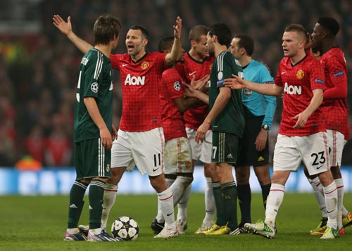 Ryan Giggs of Manchester United reacts after Nani is sent off during the UEFA Champions League