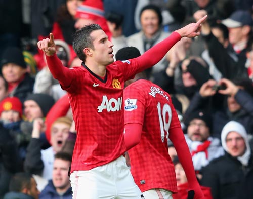 Robin van Persie of Manchester United celebrates after scoring