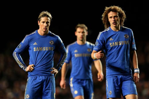 Chelsea players walk off the pitch