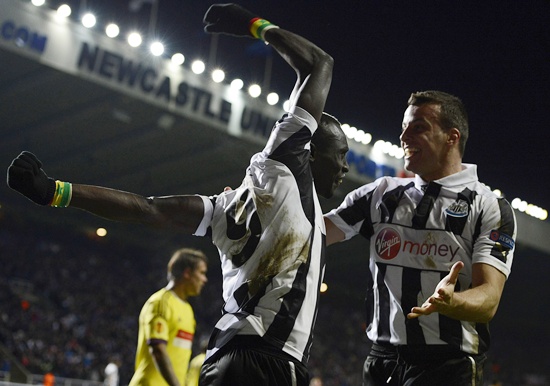 Newcastle United's Papiss Cisse (left) celebrates scoring with Steven Taylor