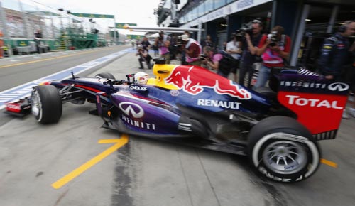 Red Bull Formula One driver Sebastian Vettel of Germany leaves his pit during the first practice session of the Australian GP