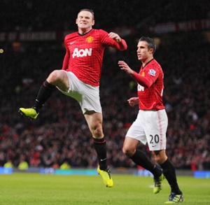 Rooney celebrates after scoring aagainst Reading