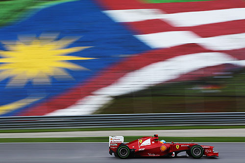Fernando Alonso of Spain and Ferrari drives on his way to winning the Malaysian Formula One Grand Prix at the Sepang Circuit on March 25, 2012 in Kuala Lumpur, Malaysia