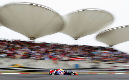 ebastian Vettel of Germany and Red Bull Racing drives during the Chinese Formula One Grand Prix at the Shanghai International Circuit on April 15, 2012 in Shanghai, China