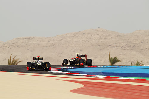 Kimi Raikkonen of Finland and Lotus leads from team mate Romain Grosjean of France and Lotus during the Bahrain Formula One Grand Prix at the Bahrain International Circuit
