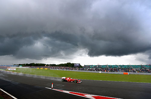 Fernando Alonso of Spain and Ferrari drives on his way to finishing first during qualifying for the British Grand Prix at Silverstone Circuit on July 7, 2012 in Northampton, England