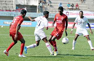 Players in action during the match between Churchill Brothers and Air India on Tuesday