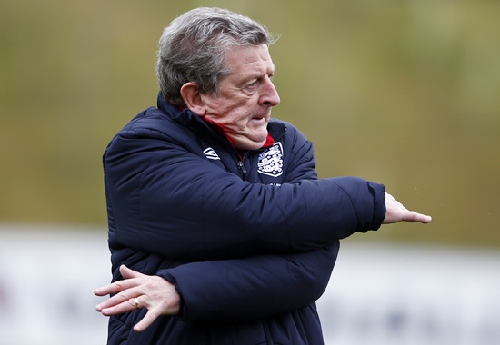 England manager Roy Hodgson stretches