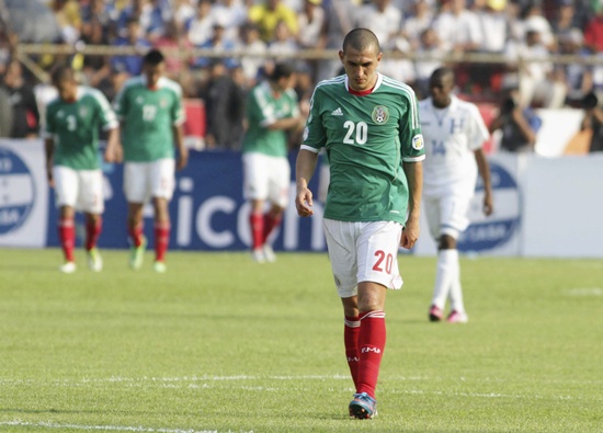 Mexico's Jorge Torres Nilo leaves the field