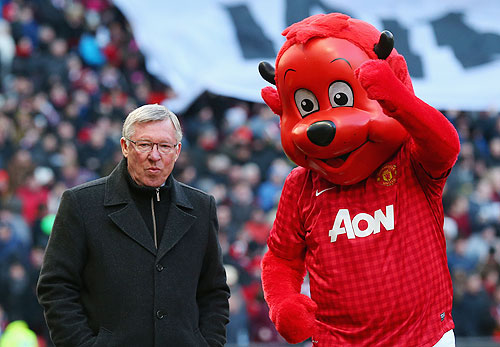 Manchester United Manager Sir Alex Ferguson with Mascot Fred the Red