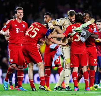 Bayern Munich players celebrate winning the semi-final match against Barcelona