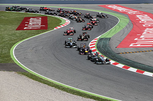 Nico Rosberg of Germany and Mercedes GP leads the field through the first corner at the start of the Spanish Formula One Grand Prix at the Circuit de Catalunya on Sunday