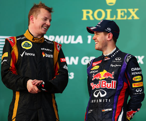 Kimi Raikkonen (left) with Sebastian Vettel