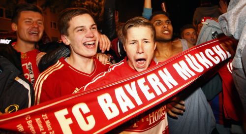 Supporters of Bayern Munich react after their teams win over Borussia Dortmund in Champions League final