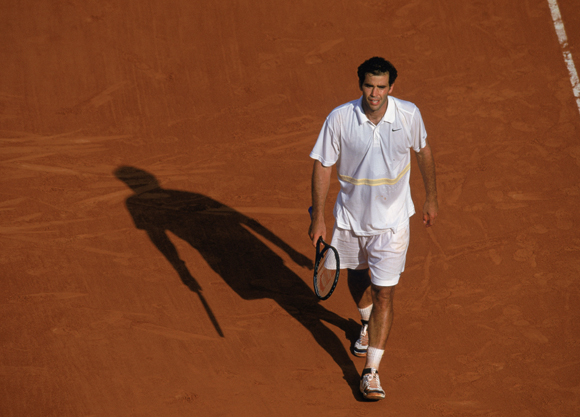 Pete Sampras walks on the tennis court during the 2001 French Open
