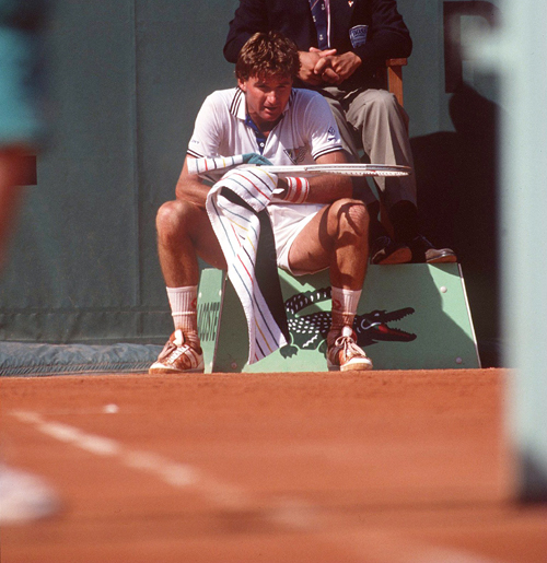 Jimmy Connors takes rest during a French Open match