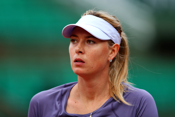 Maria Sharapova of Russia looks on during her match against Eugenie Bouchard of Canada
