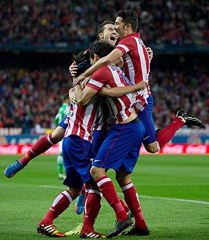 Atletico Madrid players celebrate a goal