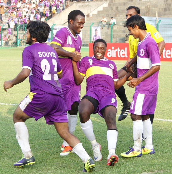 Ranti Martins (centre) celebrates with team-mates