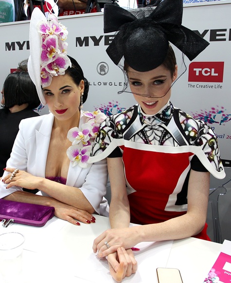 Dita von Teese (left) and Canadian model Coco Rocha look on   during judging of Myer Fashions on the Field during Melbourne Cup Day