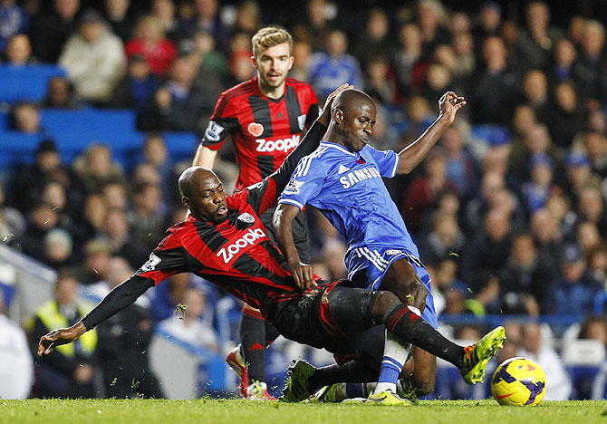 Youssof Mulumbu of West Brom and Chelsea's Ramires fight for possession during their Barclays Premier League match at Stamford Bridge on Saturday