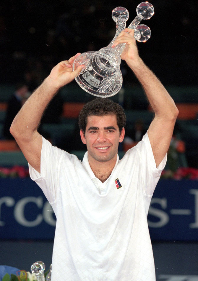 Pete Sampras of the USA lifts the trophy after winning the ATP Tour World Championships in Hannover