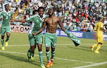 Victor Moses of Nigeria (right) celebrates after scoring a goal against Ethiopia during their 2014 World Cup qualifying playoff match at U.J Esuene stadium in Calabar on Saturday