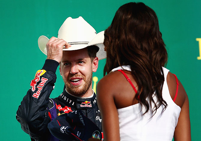 Sebastian Vettel of Germany and Red Bull Racing celebrates on the podium after winning the United States Formula One Grand Prix at Circuit of The Americas in Austin, Texas