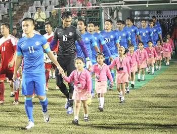 Sunil Chhetri leads the Indian team out against Nepal on Tuesday