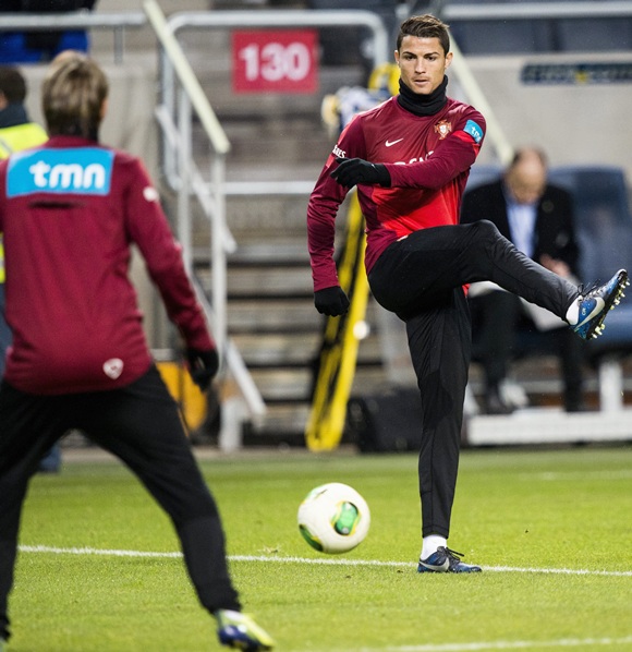 Portugal's Cristiano Ronaldo (right) takes part in a training session at the Friends Arena in Stockholm