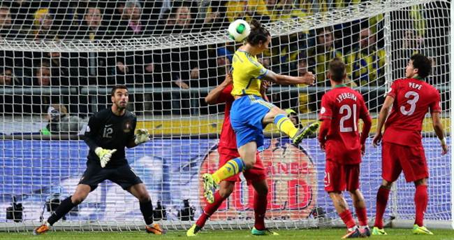 Zlatan Ibrahimovic (centre) heads Sweden's equalizing goal