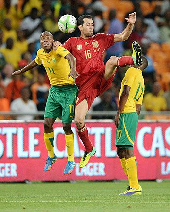 Sergio Busquets of Spain wins the header during the International friendly match between South Africa and Spain at Soccer City Stadium in Johannesburg on Tuesay